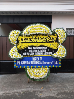 Papan Bunga Duka di Wayame